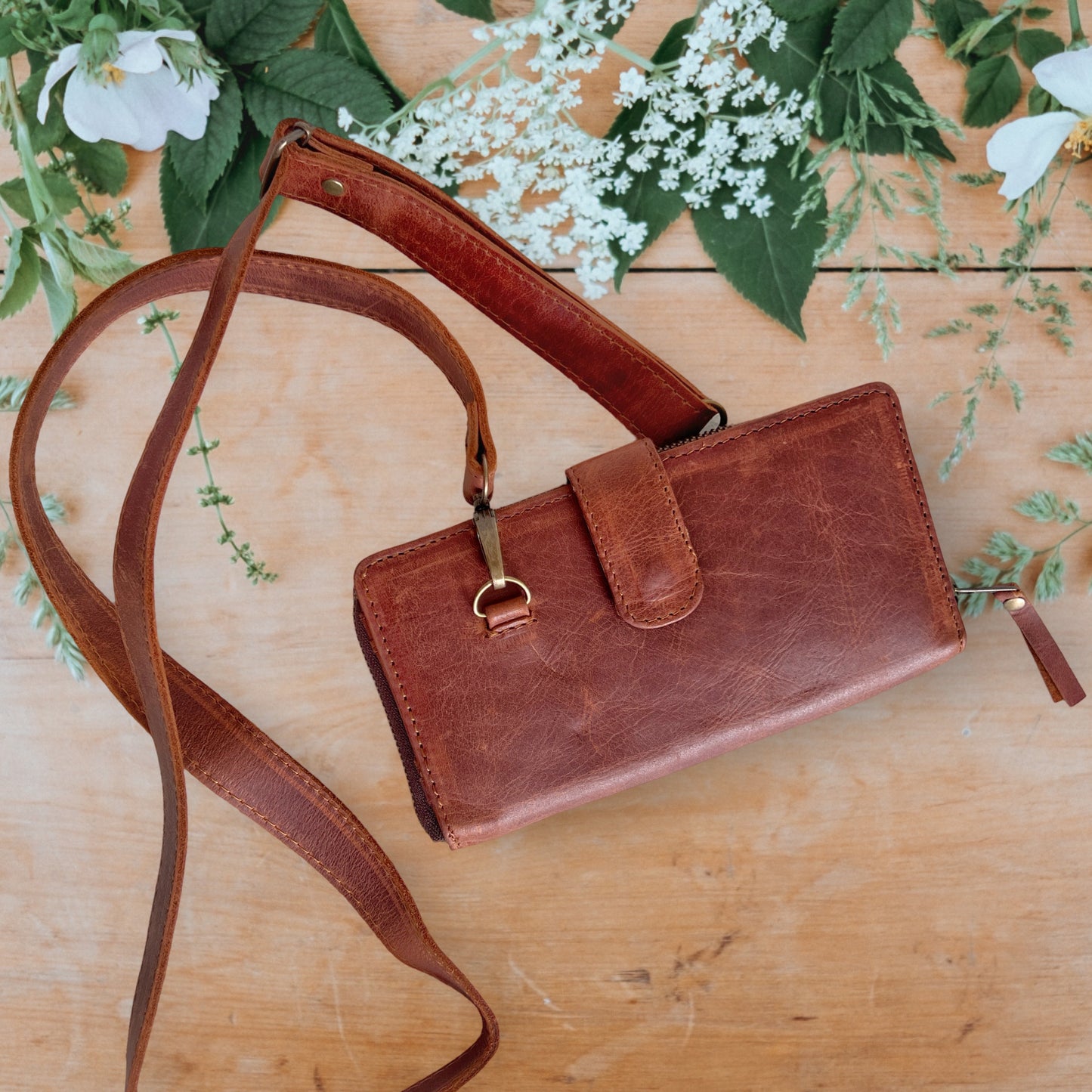 PHOENIX SLING PURSE