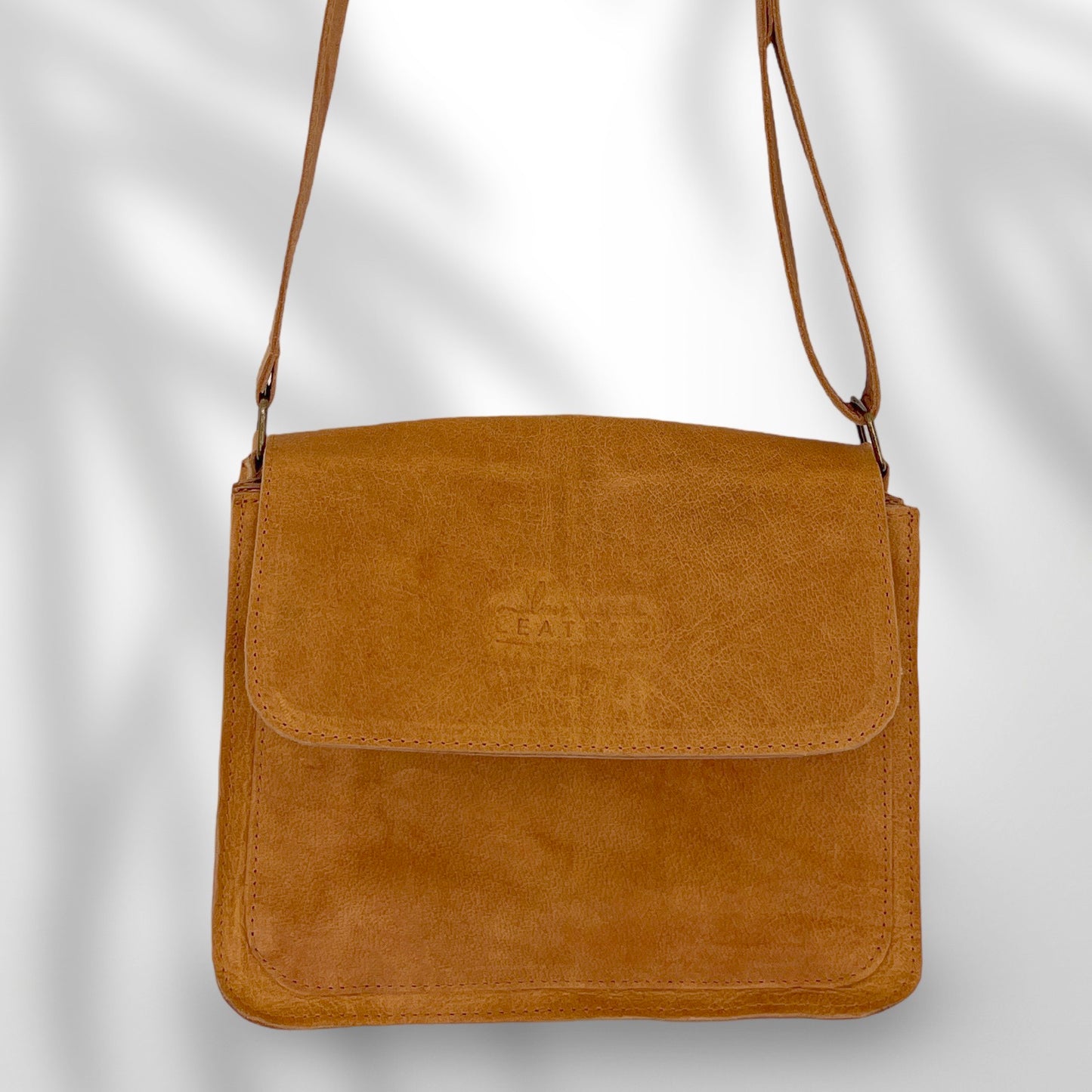 Postman style leather handbag in Urban Mustard colour