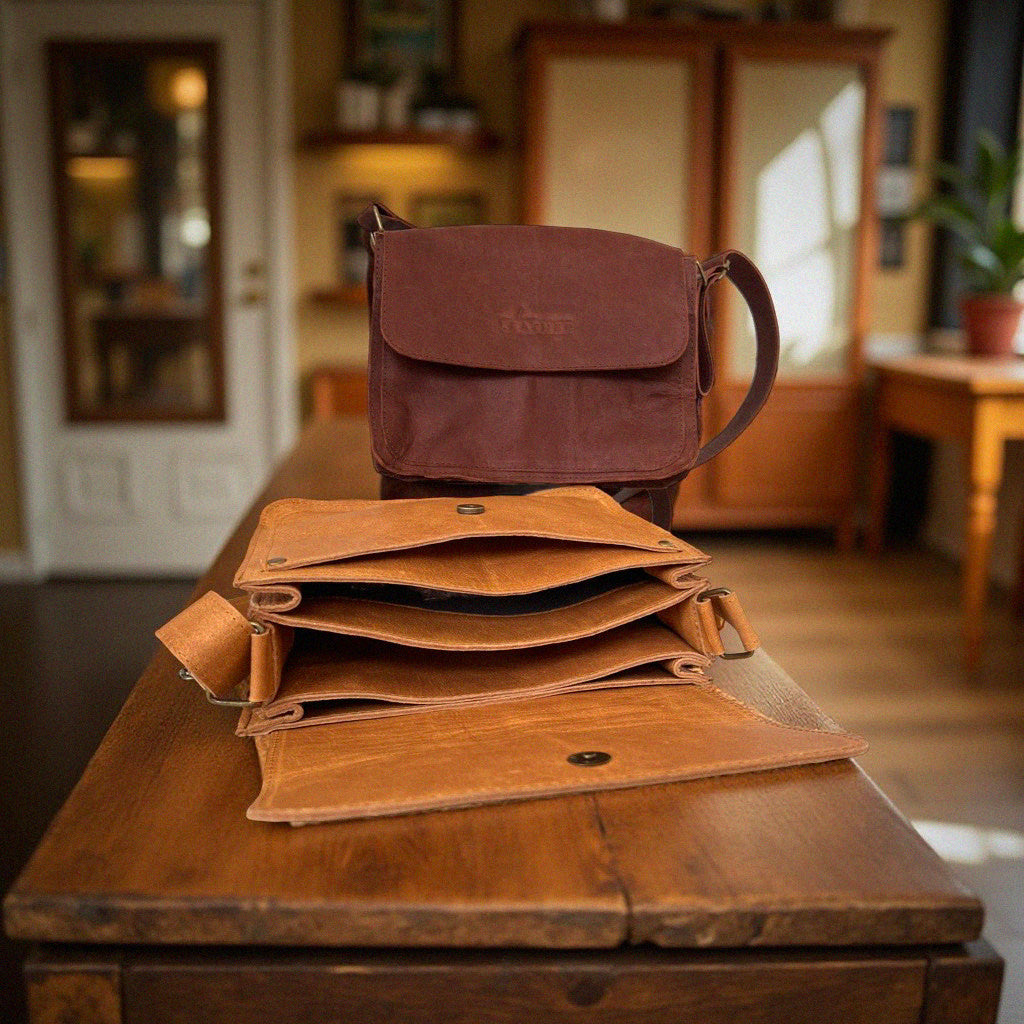 Two colours of Postman style vintage leather handbag