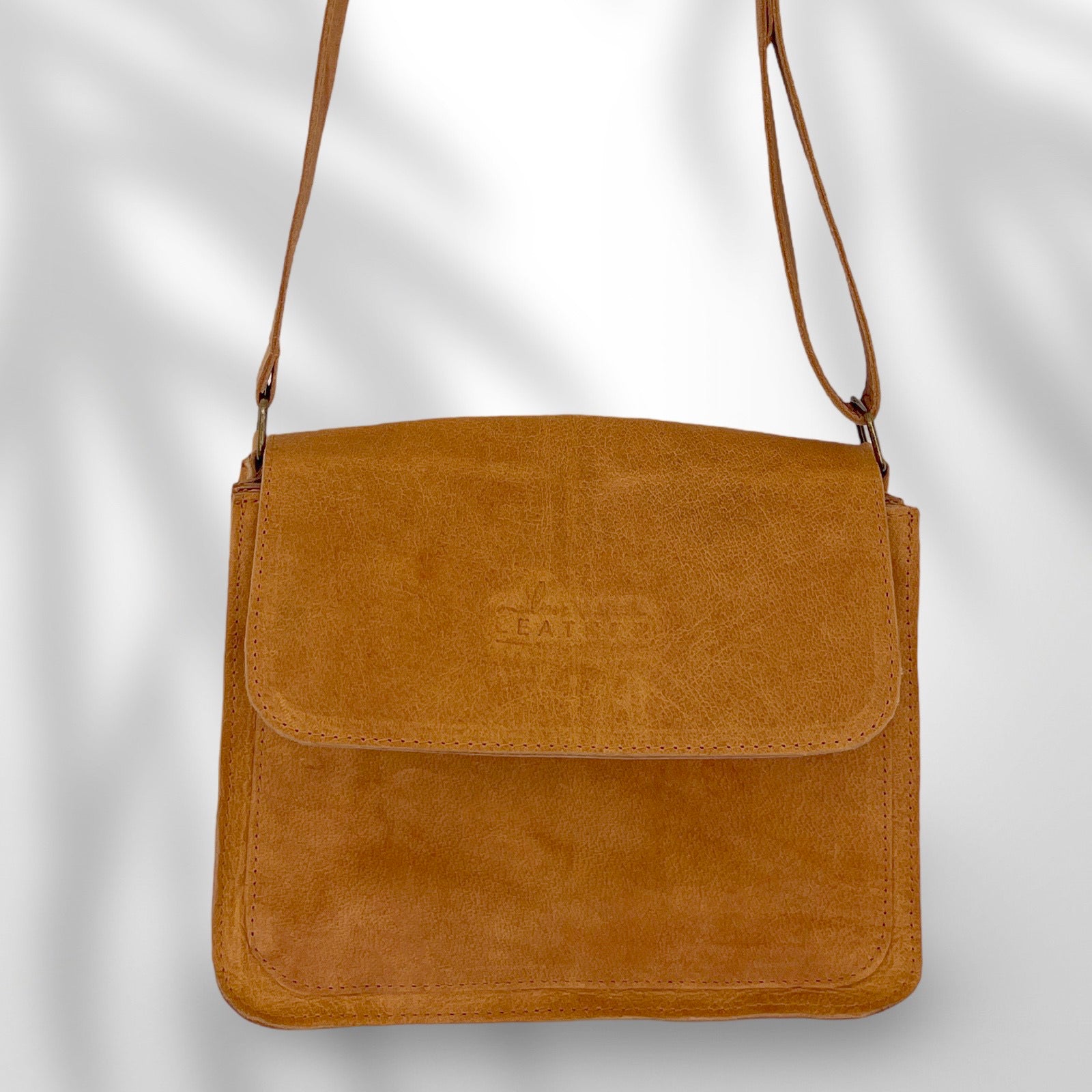 Postman style leather handbag in Urban Mustard colour